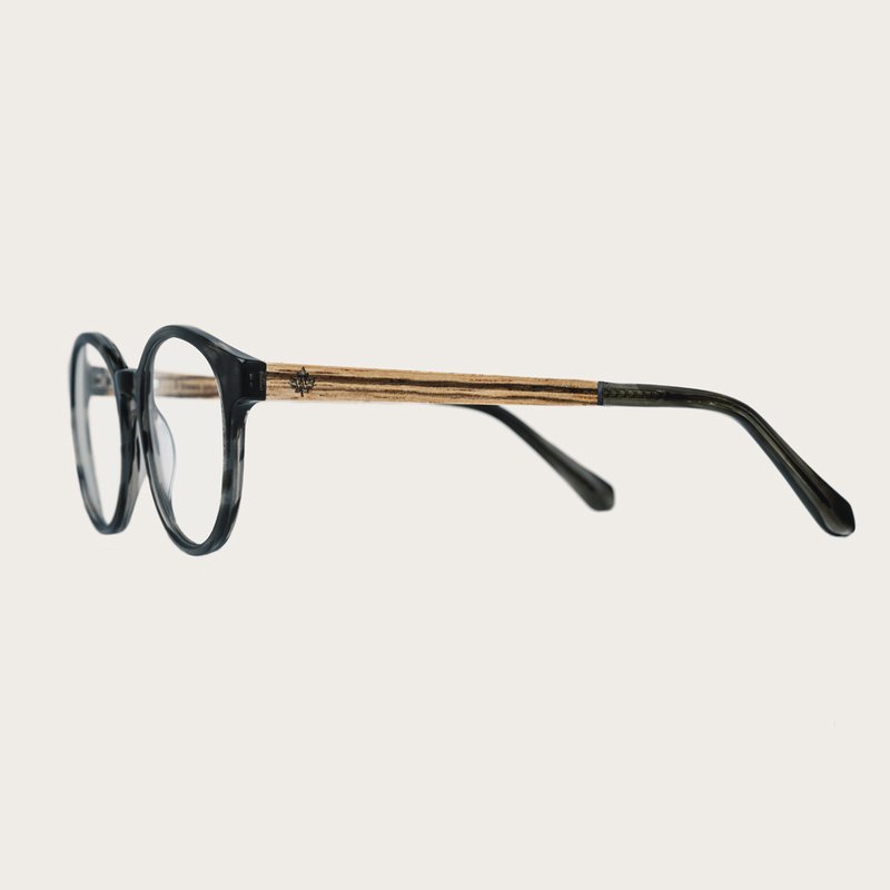 Filter out harmful excess blue light which can cause eye strain, headaches and poor sleep. The SOHO Heritage features an oval grey tortoise frame and is composed of durable Italian Mazzucchelli bio-acetate with hand-finished natural zebrawood temples and