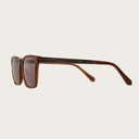 La paire de lunettes, BROOKLYN Classic Havans Brown poséde un cadre carré en écaille de tortue jaune foncé avec des verres bruns moka. Fabriquée à partir de bois durable et du bioacétate Mazzuchelli Italien avec des branches et écaille de tortue en ébène