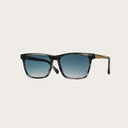 La paire de lunettes BROOKLYN Heritage Gradient Blue poséde un cadre carré en écaille gris avec des verres en bleu dégradé. Fabriquée à partir de bois durable et du bioacétate Mazzuchelli Italien avec des branches de bois zèbre naturel et des manchons en