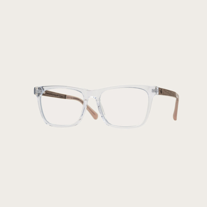 Filter out harmful excess blue light which can cause eye strain, headaches and poor sleep. The BROOKLYN Clear features a squared clear frame and is composed of durable Italian Mazzucchelli bio-acetate with hand-finished natural senna siamea wood temples a