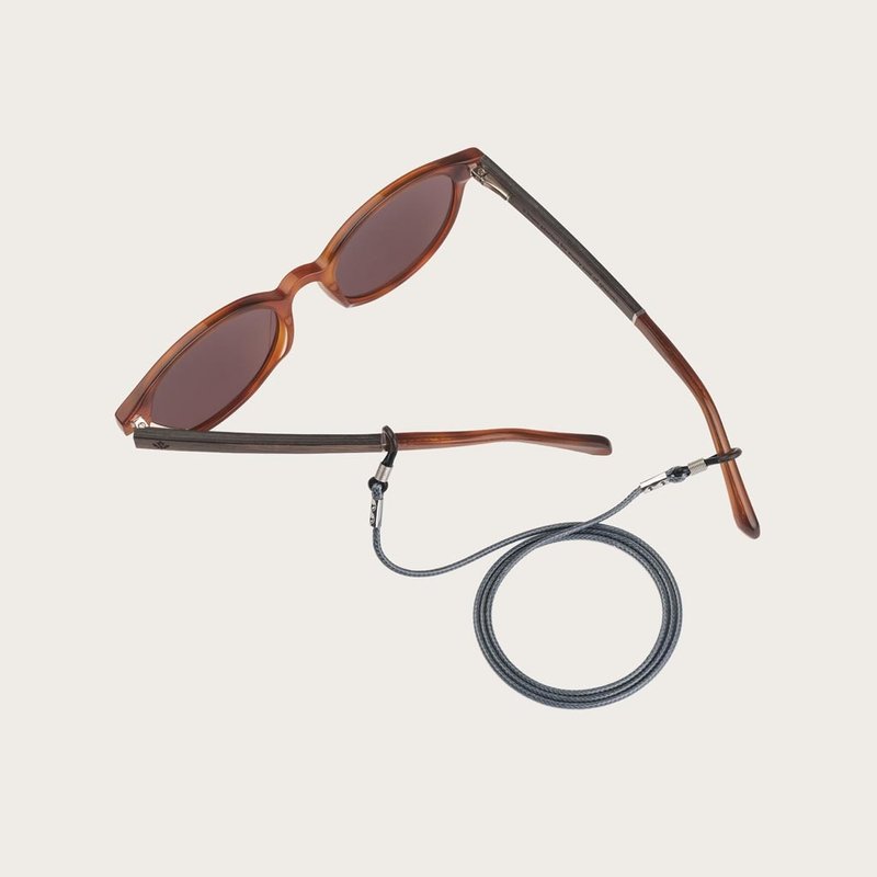 Tired of losing or breaking your glasses or sunglasses? We are dedicated to protecting your eyewear, fashionably. Oozing with style, this subtle, grey leather-look cord can be perfectly matched with your WoodWatch Eyewear, or simply attach it to your own