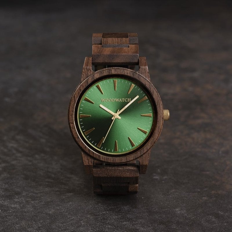 The Camo Walnut features a modernized minimal green dial with bold details in a 45mm case. A wrist essential combining natural wood with stainless steel and sapphire coated glass. The Camo Walnut is handmade from American Walnut Wood.