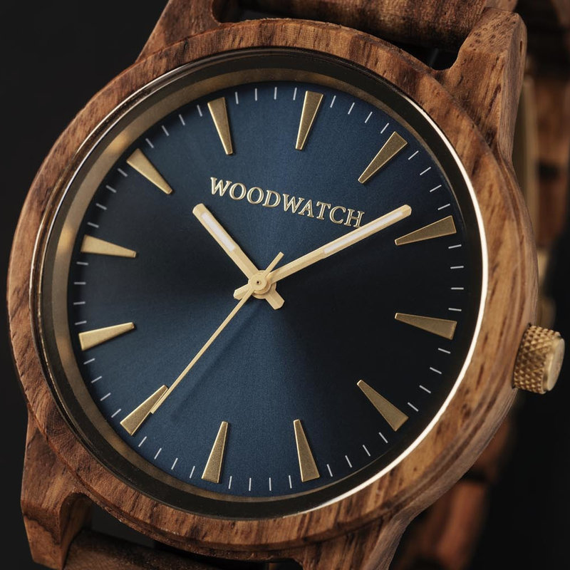 The Astro Kosso features a modernized minimal blue dial with bold details in a 45mm case. A wrist essential combining natural wood with stainless steel and sapphire coated glass. The Astro Kosso is handmade from natural Kosso wood from East Africa.