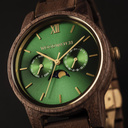 The men's CLASSIC Hunter watch has a classy slim case while featuring a unique moonphase movement and two extra subdials. The watch is made of North American Walnut Wood and features a green dial and golden-colored details. It is a perfect match with the