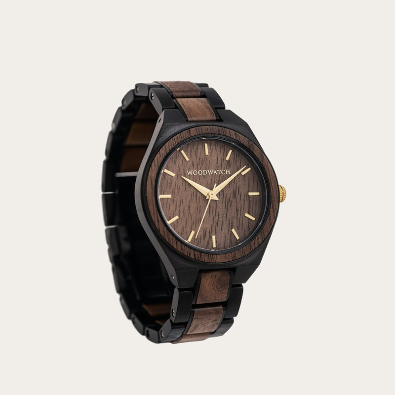 UNITY Abyss es un reloj elegante que combina dos elementos fuertes para crear un diseño clásico. El reloj une una correa de acero inoxidable negro y una caja de 38 mm con nuestras características de madera exclusivas. Con agujas de color dorado, tanto la