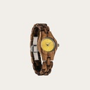 El reloj Senna de la Colección FLORA está formado por madera blanda zebrano que ha sido formada a mano hasta su más fina esbeltez. El Senna cuenta con una esfera amarilla con detalles plateados.