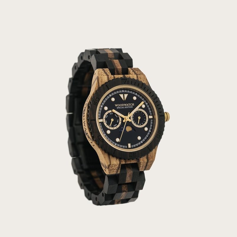 Now available in limited availability - our ODYSSEY Special Edition. Made by hand from a unique combination of Ebony Wood from Eastern Africa and Zebrawood from Western Africa and featuring golden details. Only 100 pieces are available. Each watch is uniq