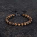 Il nostro braccialetto  Zebrano Beads realizzato a mano presenta una combinazione di perle da 8 mm di Zebrano. Il bracciale è regolabile e si adatta alla maggior parte delle misure di polso. L'accessorio perfetto da affiancare a qualsiasi WoodWatch.