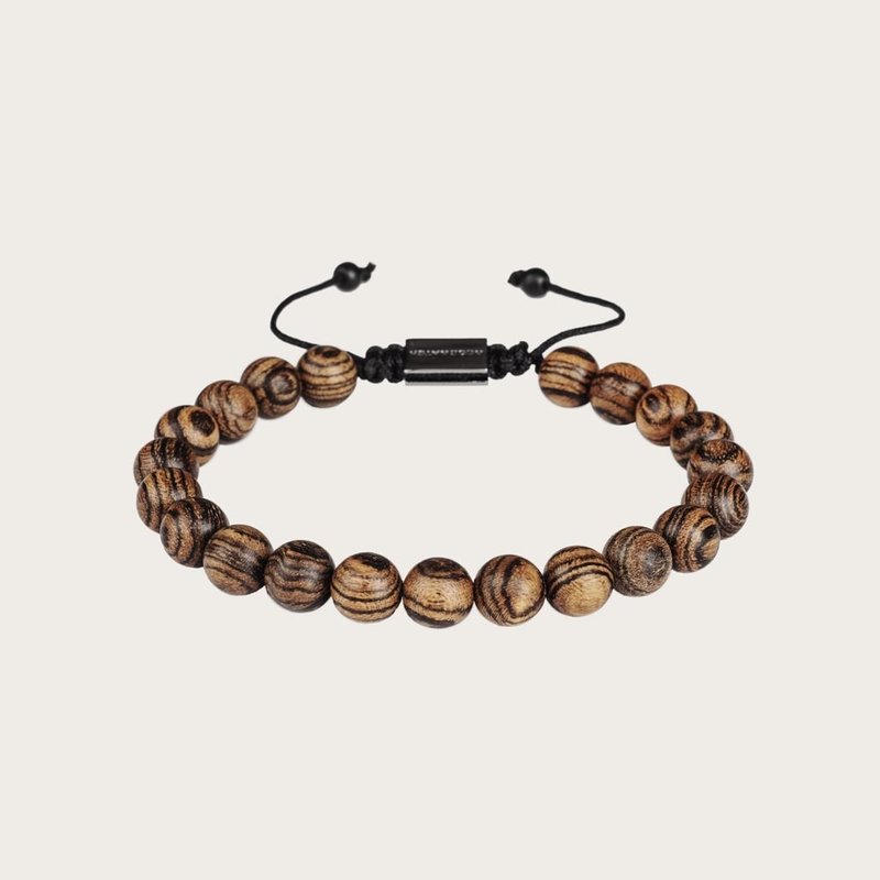 Our handmade Zebrawood Beads Bracelet features a combination of 8mm Zebrawood beads. This bracelet is adjustable and fits most wrist sizes. The perfect accessory to go with any WoodWatch.