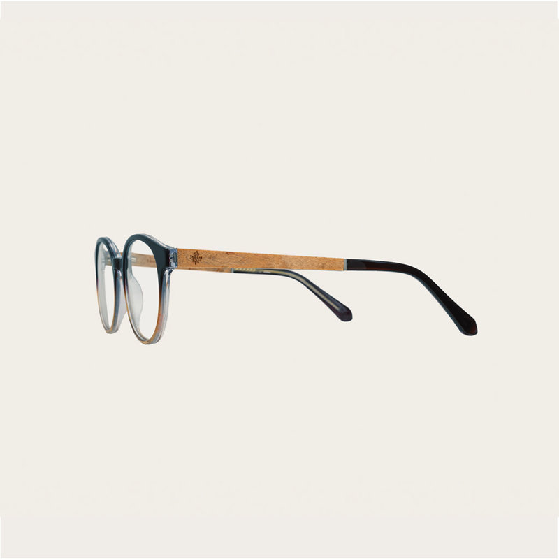 Filter out harmful excess blue light which can cause eye strain, headaches and poor sleep. The SOHO Vanilla features an oval dark brown and beige tortoise frame and is composed of durable Italian Mazzucchelli bio-acetate with hand-finished natural maple w