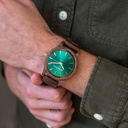 The Camo Walnut features a modernized minimal green dial with bold details in a 45mm case. A wrist essential combining natural wood with stainless steel and sapphire coated glass. The Camo Walnut is handmade from American Walnut Wood.