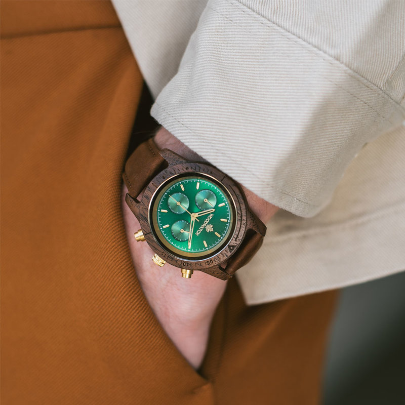 Emerald Gold Pecan features a classic SEIKO VD54 chronograph movement, scratch resistant sapphire coated glass and pecan strap. Made from American Walnut Wood and handcrafted to perfection. All featuring a 42mm diameter case. The watch is available with a