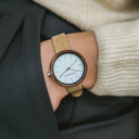Inspired by contemporary Nordic minimalism. The NORDIC Stockholm Beige features a 36mm diameter walnut case with a white dial and silver details. Handmade from sustainably sourced wood combined with an ultra soft beige sustainable vegan leather strap.