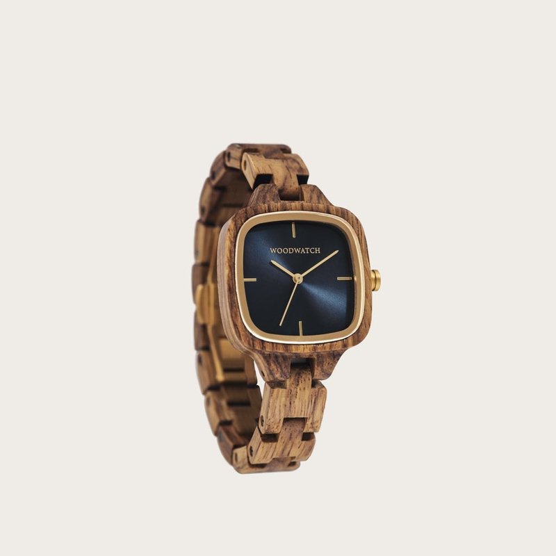 The CITY Starlight features a 30mm square case with a dark navy blue dial and golden details. The watch band consists of natural kosso wood that has been hand-finished to perfection and to create our latest small-band design.