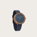 Inspired by contemporary Nordic minimalism. The NORDIC Malmo Navy features a 36mm diameter kosso wood case with a blue dial and golden details. Handmade from sustainably sourced wood combined with an ultra soft navy blue sustainable vegan leather strap.