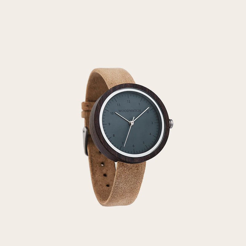 Inspired by contemporary Nordic minimalism. The NORDIC Helsinki Beige features a 36mm diameter black sandalwood case with a cool grey dial and silver details. Handmade from sustainably sourced wood and combined with an ultra soft beige sustainable vegan l