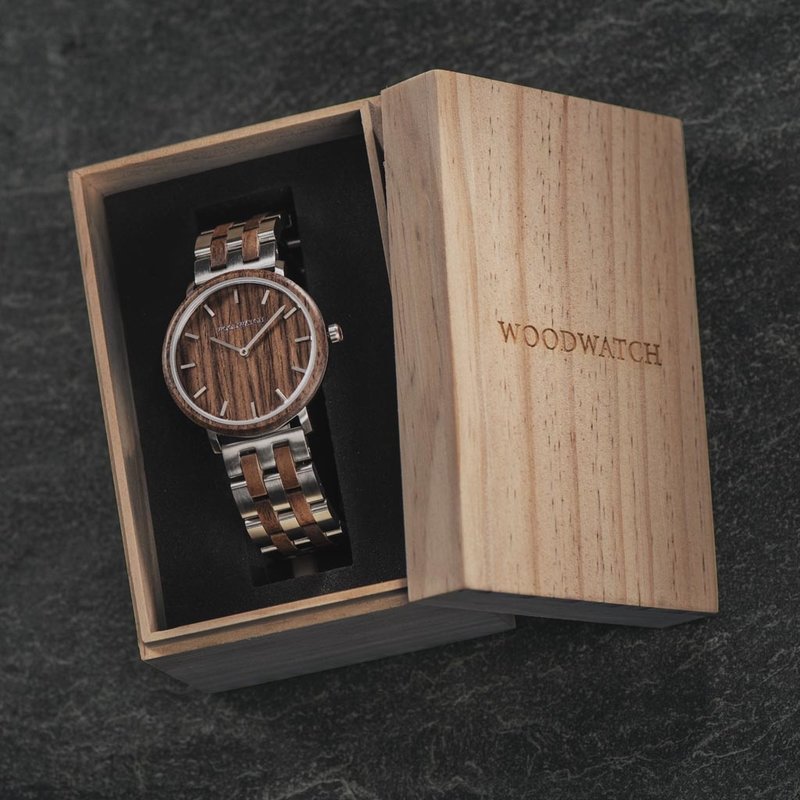 A renewed MINIMAL design with a timeless look that matches any occasion. Featuring a thin, steel case, and walnut bezel and dial. Comes with a new watch strap, designed from the ground up to perfectly match the minimal watch case in style and materials.