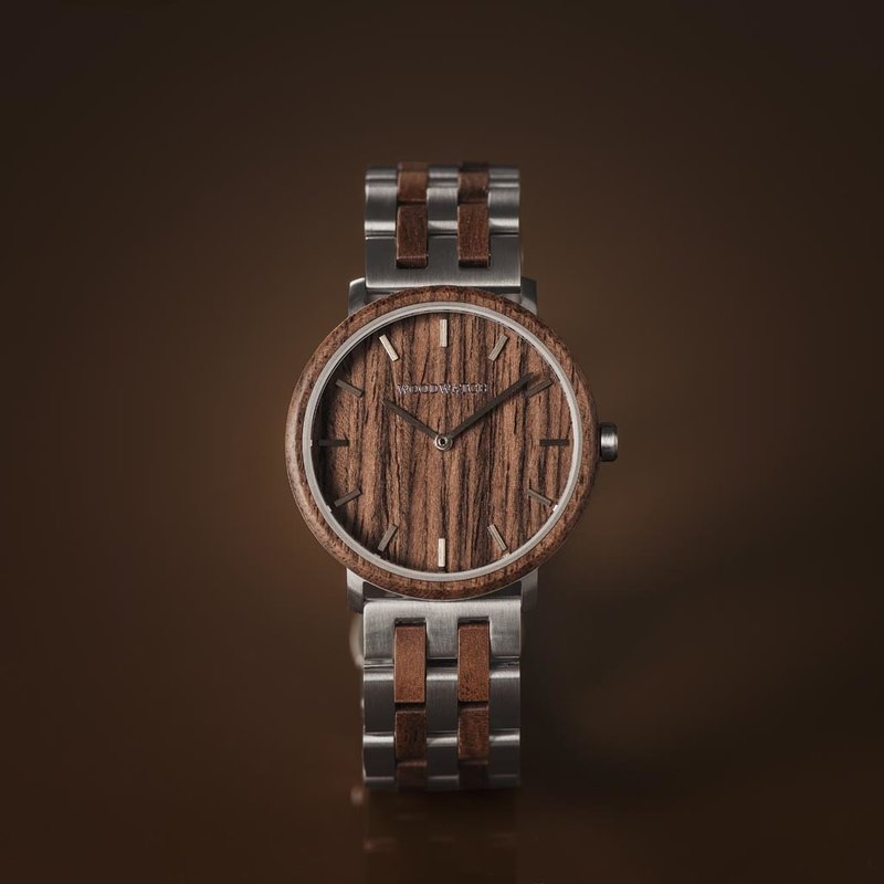 A renewed MINIMAL design with a timeless look that matches any occasion. Featuring a thin, steel case, and walnut bezel and dial. Comes with a new watch strap, designed from the ground up to perfectly match the minimal watch case in style and materials.