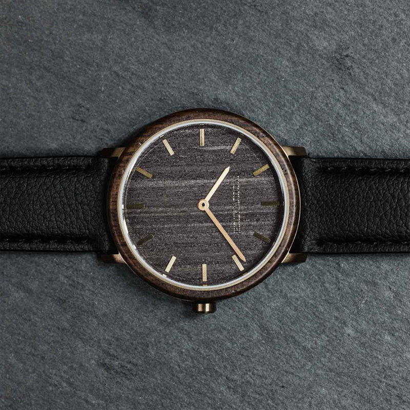 A renewed MINIMAL design with a timeless look that matches any occasion. Featuring a thin, steel case, and leadwood bezel and bronze dial. Comes with a cactus leather strap in matching black, extremely soft and durable, made from cactus leaves from Mexico