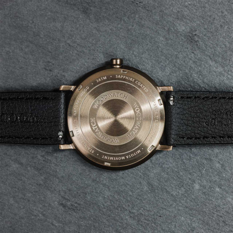 A renewed MINIMAL design with a timeless look that matches any occasion. Featuring a thin, steel case, and leadwood bezel and bronze dial. Comes with a cactus leather strap in matching black, extremely soft and durable, made from cactus leaves from Mexico