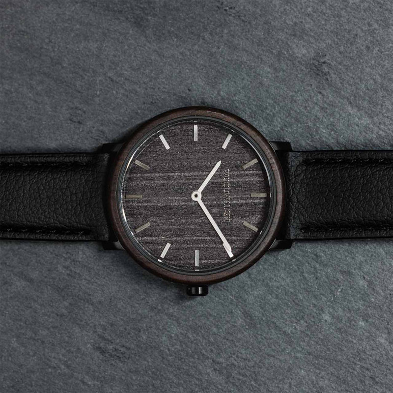 A renewed MINIMALl design with a timeless look that matches any occasion. Featuring a thin, black case, and leadwood bezel and dial. Comes with a cactus leather strap in matching black, extremely soft and durable, made from cactus leaves from Mexico.