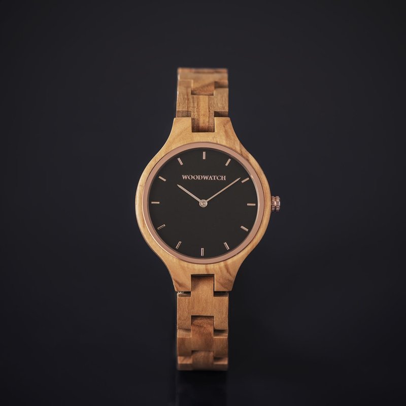 The AURORA Collection breaths the fresh air of Scandinavian nature and the astonishing views of the sky. This light weighing watch is made of European Olive Wood, accompanied by a stainless-steel sky-black dial and starry rose-gold details. The watch is a