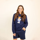 Jersey suave unisex de manga larga y cuello redondo. Hecho con 85 % algodón orgánico y 15 % poliéster reciclado, tiene el logo de Harvey entero bordado.