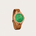 The AURORA Collection breaths the fresh air of Scandinavian nature and the astonishing views of the sky. This light weighing watch is made of olive wood, accompanied by a green stainless-steel dial with golden details.<br />
Comes with a cactus leather strap i