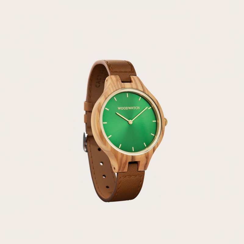 The AURORA Collection breaths the fresh air of Scandinavian nature and the astonishing views of the sky. This light weighing watch is made of olive wood, accompanied by a green stainless-steel dial with golden details.<br />
Comes with a cactus leather strap i