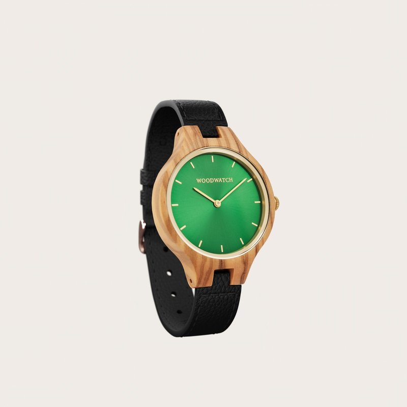 The AURORA Collection breaths the fresh air of Scandinavian nature and the astonishing views of the sky. This light weighing watch is made of olive wood, accompanied by a green stainless-steel dial with golden details.<br />
Comes with a cactus leather strap i