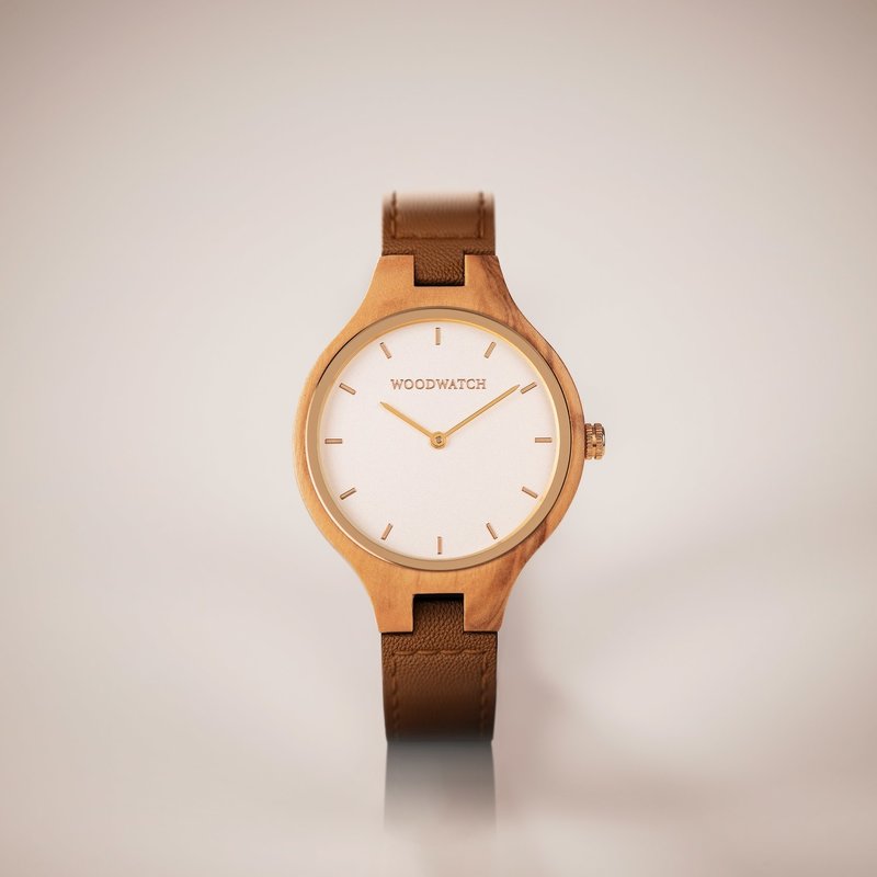 The AURORA Collection breaths the fresh air of Scandinavian nature and the astonishing views of the sky. This light weighing watch is made of European Olive Wood, accompanied by a light stainless-steel dial with a golden highlight and shining golden detai