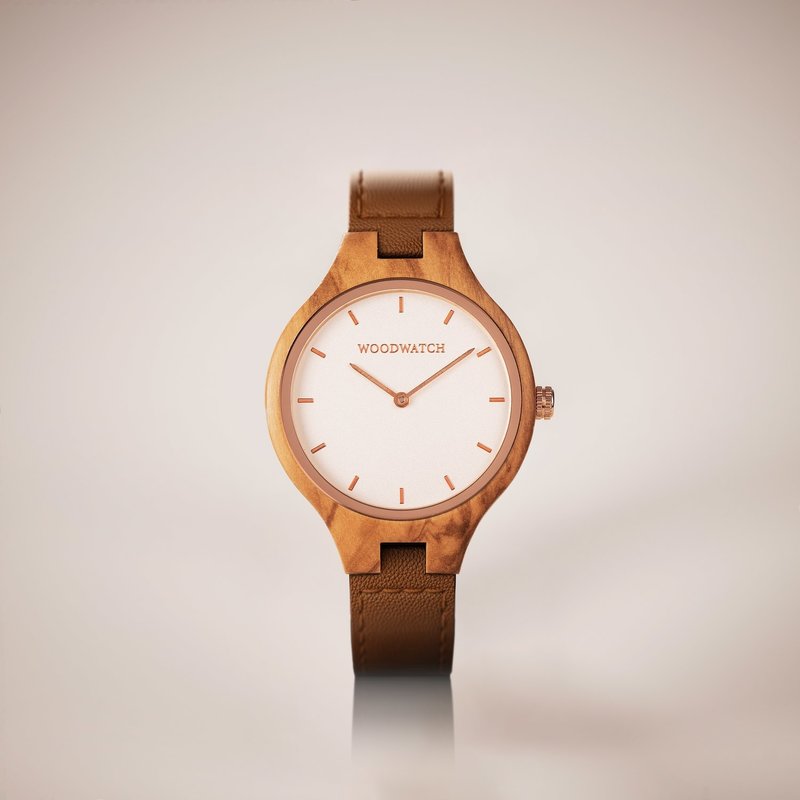 The AURORA Collection breaths the fresh air of Scandinavian nature and the astonishing views of the sky. This light weighing watch is made of European Olive Wood, accompanied by a light stainless-steel dial with a rose gold highlight and shining rose gold