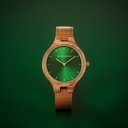 The AURORA Collection breaths the fresh air of Scandinavian nature and the astonishing views of the sky. This light weighing watch is made of olive wood, accompanied by a green stainless-steel dial with golden details.<br />
Comes with a cactus leather strap i