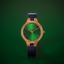 The AURORA Collection breaths the fresh air of Scandinavian nature and the astonishing views of the sky. This light weighing watch is made of olive wood, accompanied by a green stainless-steel dial with golden details.<br />
Comes with a cactus leather strap i