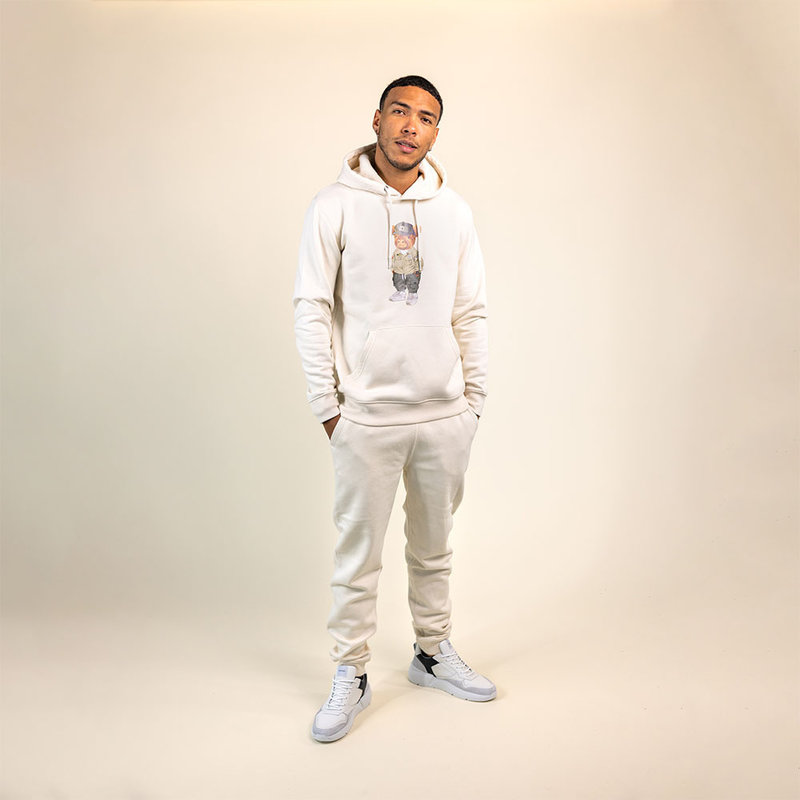 Sweat à capuche, unisexe et doux, à manches longues avec une capuche à double épaisseur et une poche kangourou sur le devant. Fabriqué à partir de 85 % de coton biologique et de 15 % de polyester recyclé, avec le logo Harvey intégral.