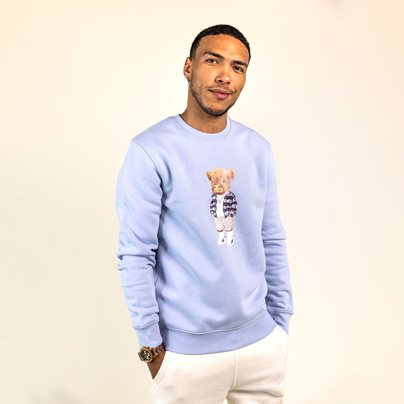 Morbido maglione unisex a maniche lunghe con collo rotondo. Realizzato all'85% in cotone organico e al 15% in poliestere riciclato, con logo Harvey stampato full body sul davanti.