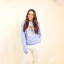 Soft unisex long-sleeved sweater with a round neck. Made of 85% organic cotton and 15% recycled polyester, featuring a full body Harvey print.