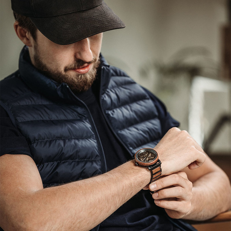 The HEROIC Red Lava is made of Tigerwood and features a black dial with dark metal details.