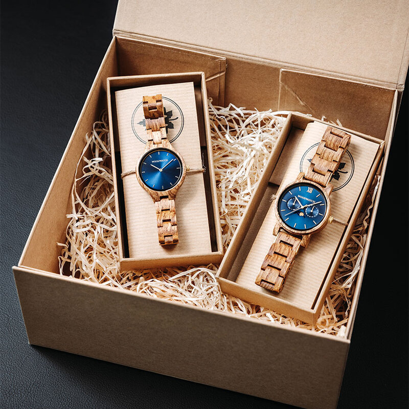 The men's CLASSIC Sailor watch has a classy slim case while featuring a unique moonphase movement and two extra subdials. The watch is made of East African Kosso Wood and features a blue dial and golden-colored details, perfectly matching the AURORA Ocean