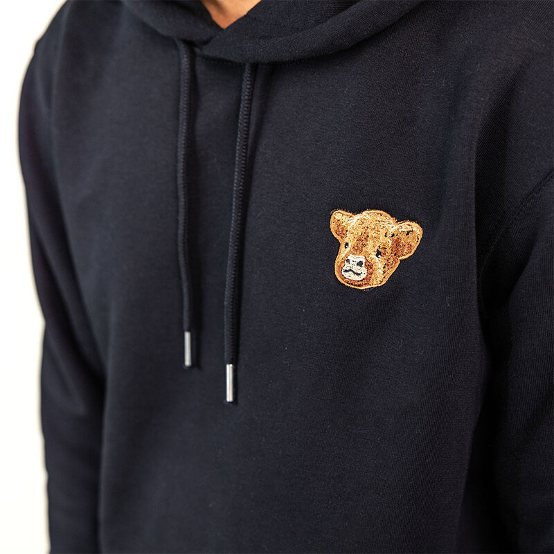 Soft unisex long-sleeved hoodie with a double layered hood and a kangaroo pocket at the front. Made of 85% organic cotton and 15% recycled polyester, featuring embroidered Harvey logo.