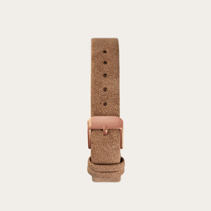 The Beige Band is made of vegan leather and a metal buckle clasp, and is naturally died with a yellow hue. The band measures 14mm and fits perfectly with the Nordic Collection.