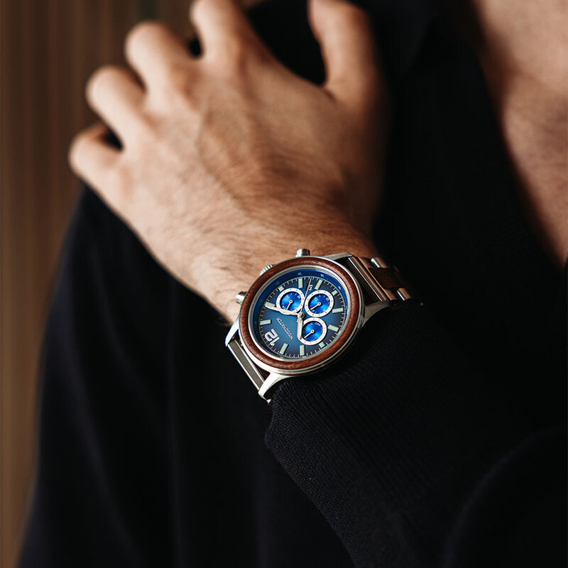Apex Elite: Sophisticated wooden watches for men. Features Japanese Movement, chronograph, stainless steel, natural wood, blue dial. Durable and stylish.