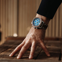 Apex Elite: Sophisticated wooden watches for men. Features Japanese Movement, chronograph, stainless steel, natural wood, blue dial. Durable and stylish.