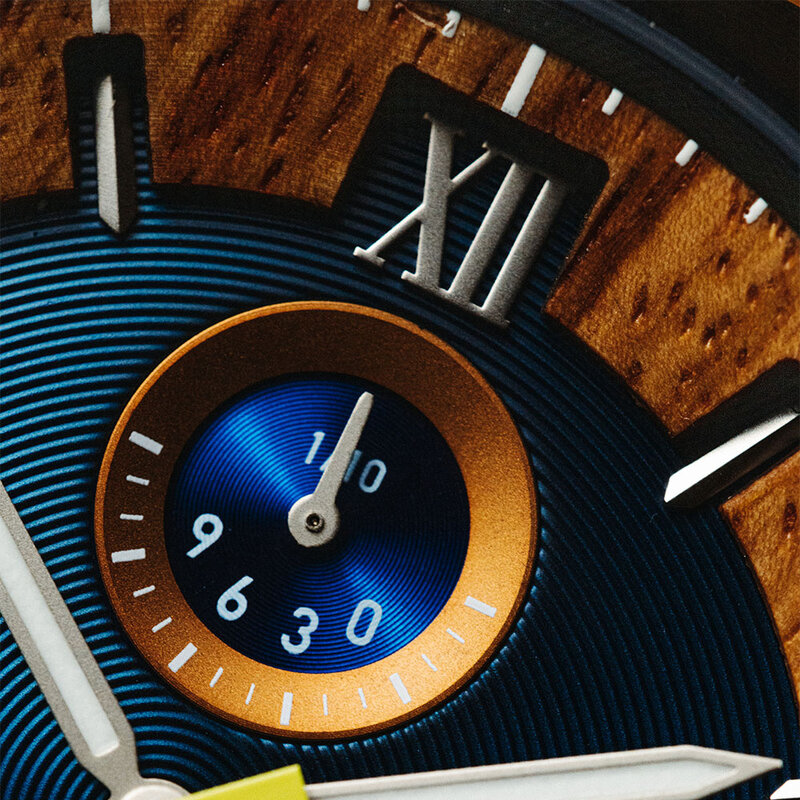 Oceanic is made of Kosso wood, featuring a blue dial.