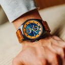 Oceanic is made of Kosso wood, featuring a blue dial.