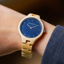 The AURORA Collection breaths the fresh air of Scandinavian nature and the astonishing views of the sky. This light weighing watch is made of Canadian Maplewood, accompanied by a blue stainless-steel dial with silver details.<br />
The watch is available with