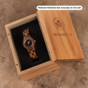 The Delphine watch from the FLORA Collection consists of kosso wood that has been hand-crafted to its finest slenderness. The Delphine features a dark navy blue dial with rosegold coloured details.