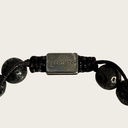 Made with rosewood beads, volcanic beads, dark green natural stone beads, and a matte black brass closure. Adjustable, with 8mm beads to fit most wrist sizes.