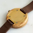 Inspired by contemporary Nordic minimalism. The NORDIC Copenhagen features a 36mm diameter white olive wood case with a white dial and gold details. Handmade from sustainably sourced wood and combined with an ultra soft beige sustainable vegan leather str