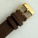 Inspired by contemporary Nordic minimalism. The NORDIC Copenhagen features a 36mm diameter white olive wood case with a white dial and gold details. Handmade from sustainably sourced wood and combined with an ultra soft beige sustainable vegan leather str